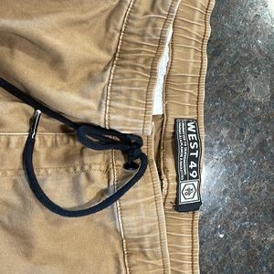 Like new condition. Lot includes 3 pairs of WEST 49 pant joggers. Son grew!